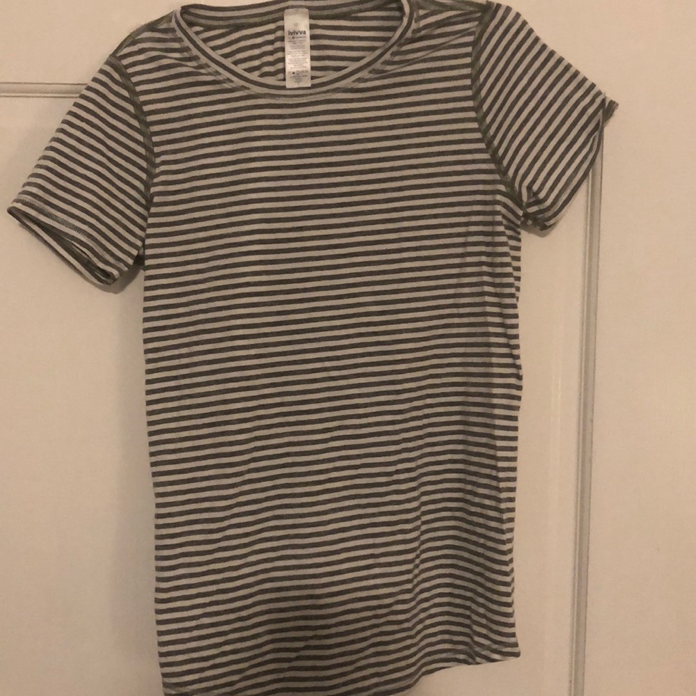 Ivivva by Lululemon white and gray striped tee.